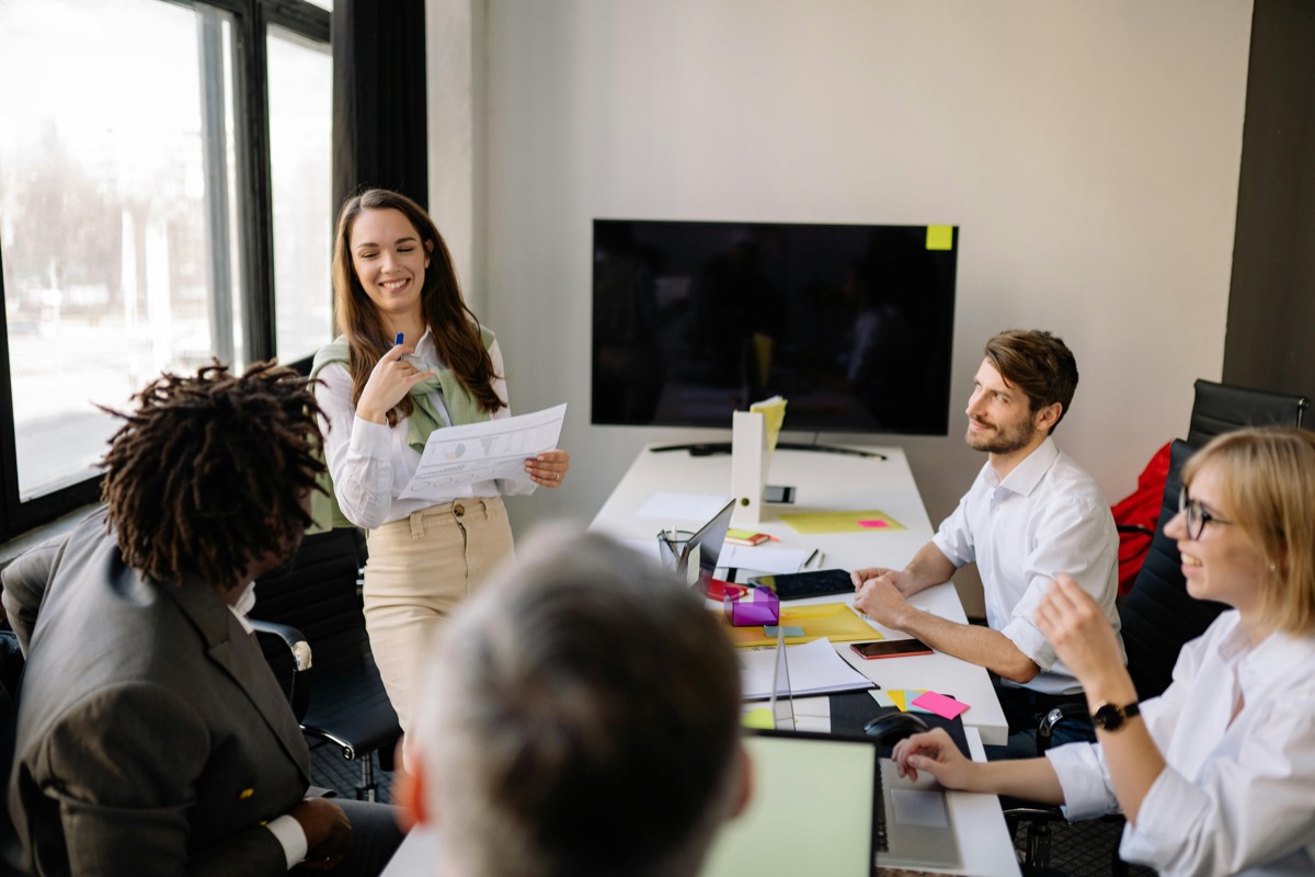 Advisers collaborating in a team meeting